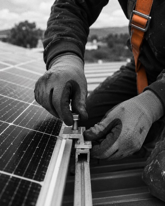 Solar Installation tradesperson at work, detail shot